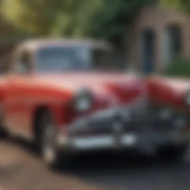 A restored vintage car parked outdoors showcasing the final result of restoration