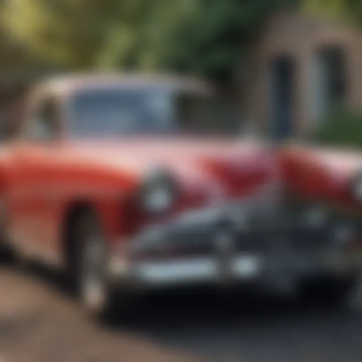 A restored vintage car parked outdoors showcasing the final result of restoration