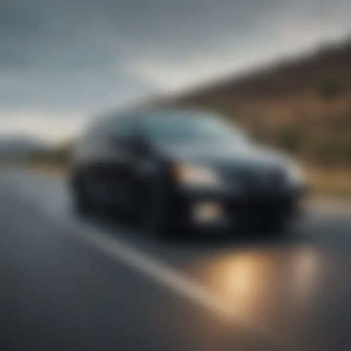 Dynamic driving shot of the all-black Honda Odyssey on the highway