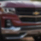 The powerful front grille of the Chevrolet Silverado Trail showcasing its robust design