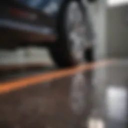 Close-up of a glossy epoxy-coated garage floor showcasing rich colors and textured patterns.
