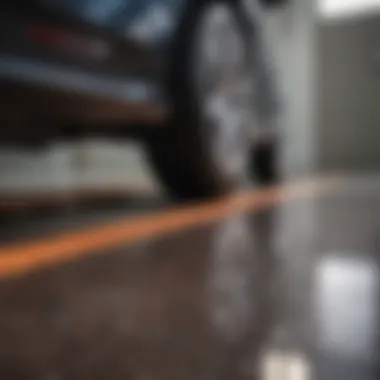 Close-up of a glossy epoxy-coated garage floor showcasing rich colors and textured patterns.