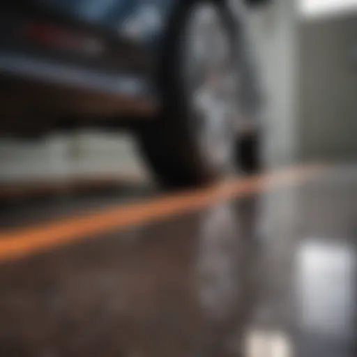 Close-up of a glossy epoxy-coated garage floor showcasing rich colors and textured patterns.