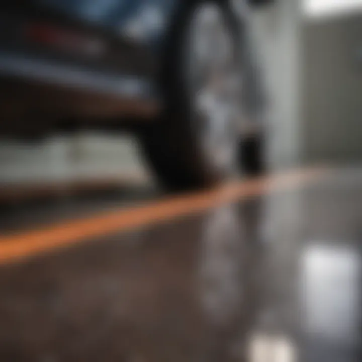 Close-up of a glossy epoxy-coated garage floor showcasing rich colors and textured patterns.