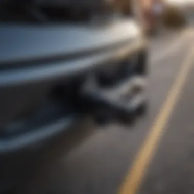 Installation of the trailer hitch on a Ford Edge Sport highlighting key components.