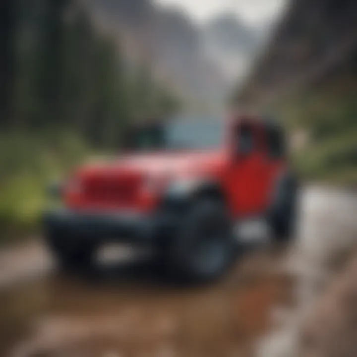 Red Jeep Wrangler 2-Door Soft Top in rugged terrain