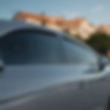 Close-up view of a window tinted car showcasing sleek aesthetics