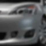 Close-up of a Nissan Maxima bumper before painting