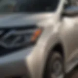 Close-up of touch-up paint application on a Nissan Rogue