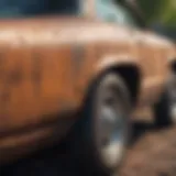 Close-up of rust forming on a car's body.