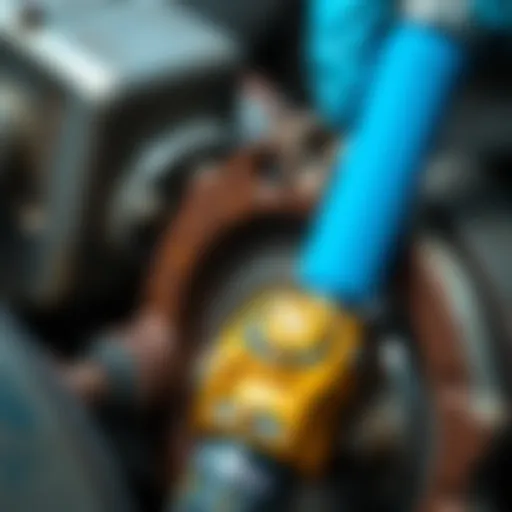 Close-up of rust penetrant application on automotive parts