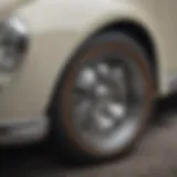 Close-up view of Daisy rims on a Volkswagen Beetle