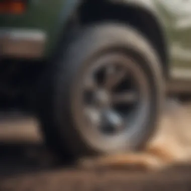 Close-up of a four-wheel drive vehicle's wheel demonstrating traction on a challenging surface