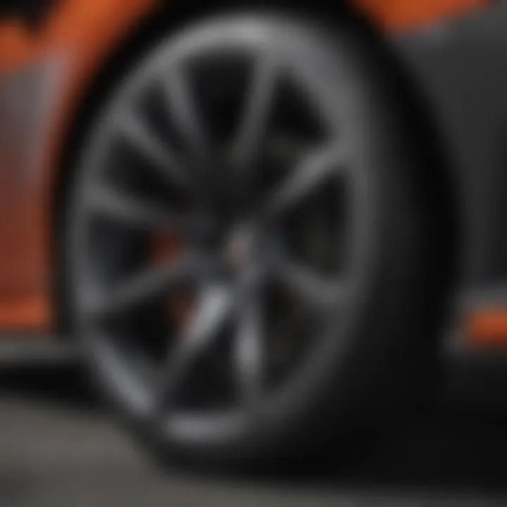 Close-up view of the performance specifications engraved on the Civic Si wheels.