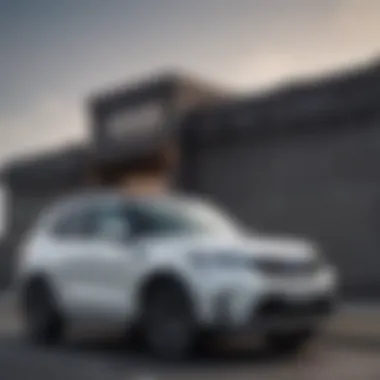 Stylish compact SUV parked under a clear sky with its panoramic sunroof open