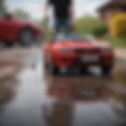 A versatile surface cleaner attachment for pressure washers in action on a driveway
