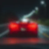 Nighttime road illuminated by headlights