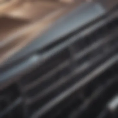 Close-up of the 1977 Chevy Impala front grill showcasing its intricate design.