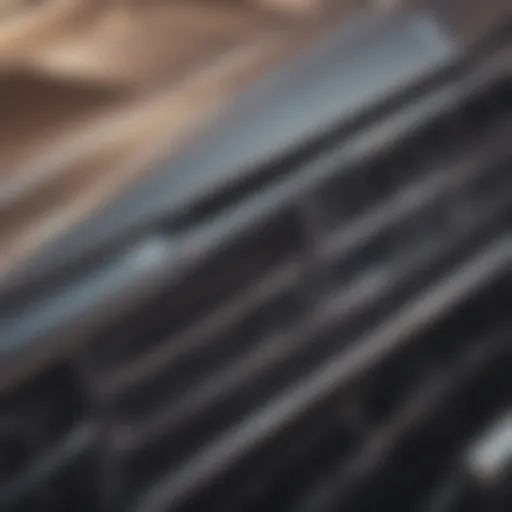 Close-up of the 1977 Chevy Impala front grill showcasing its intricate design.