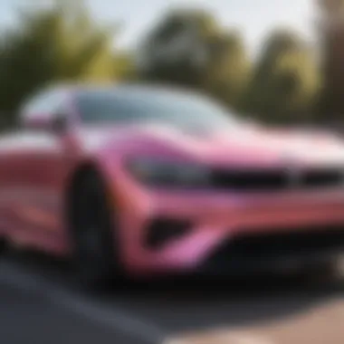 A car with a pearlescent pink wrap under natural sunlight highlighting its color-changing effects