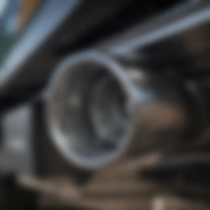 Close-up of a polished stainless steel exhaust tip installed on a truck