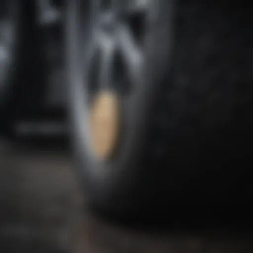 Close-up of a coin being used to measure tire tread depth
