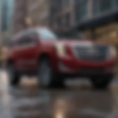 Cadillac Escalade in Urban Setting A scenic view of a Cadillac Escalade parked in an urban environment, emphasizing its size and presence