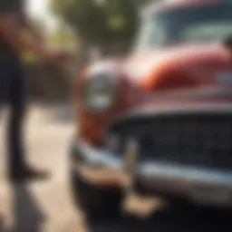 Classic car dusting a vintage vehicle under sunlight
