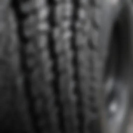 Close-up view of Power Wheels Raptor tire tread patterns showcasing grip