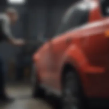 Professional painter applying paint to a car door