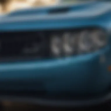 Close-up of the Dodge Challenger's sleek front grille and headlights