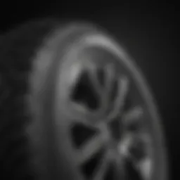 Detailed close-up of tire tread and rim specifications