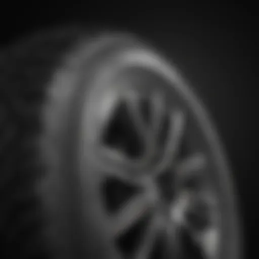 Detailed close-up of tire tread and rim specifications