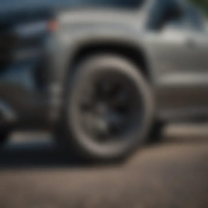 Aftermarket tire options displayed next to a 2019 Silverado 2500.