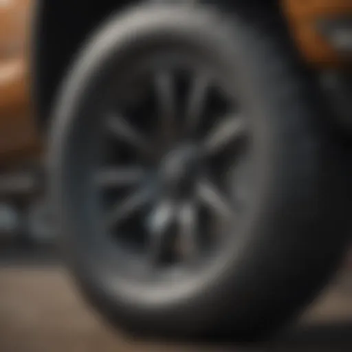 Close-up of a 2019 Silverado 2500 tire showcasing tread patterns.
