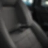 A sleek car seat gap filler showcasing innovative design.