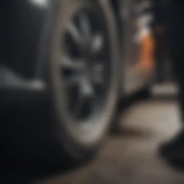 Mechanic inspecting a tire for maintenance