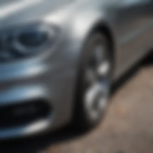 Close-up view of a car scratch revealing metal underneath