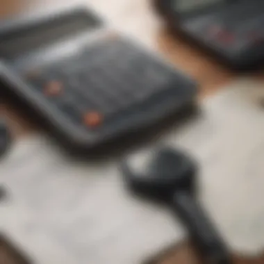 Close-up of insurance documents and a calculator