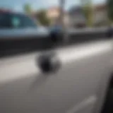 Close-up view of the tailgate assist mechanism in a 2019 Ram 1500 Classic