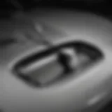 Close-up view of 2010 Ford Fusion windshield wiper mechanism