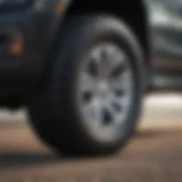 Close-up view of a 2015 GMC Yukon tire showcasing tread design