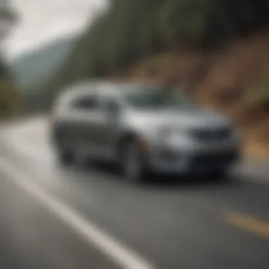 Driving Experience of the Used Pacifica AWD A scenic driving shot of the Pacifica AWD in action on a winding road