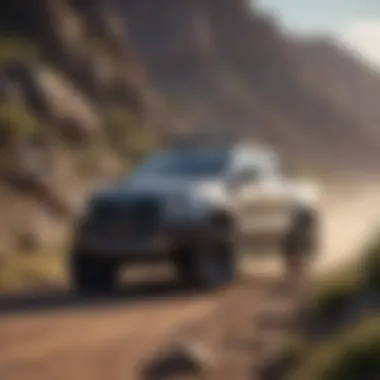 Side profile of a used Ranger driving on a rugged terrain